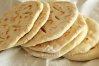 Cypriot Pita bread has a soft fluffy texture.